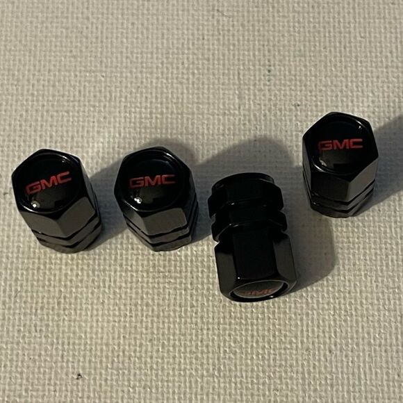 GMC Logo valve Stem caps in Black set of 4 NWT - Picture 2 of 4